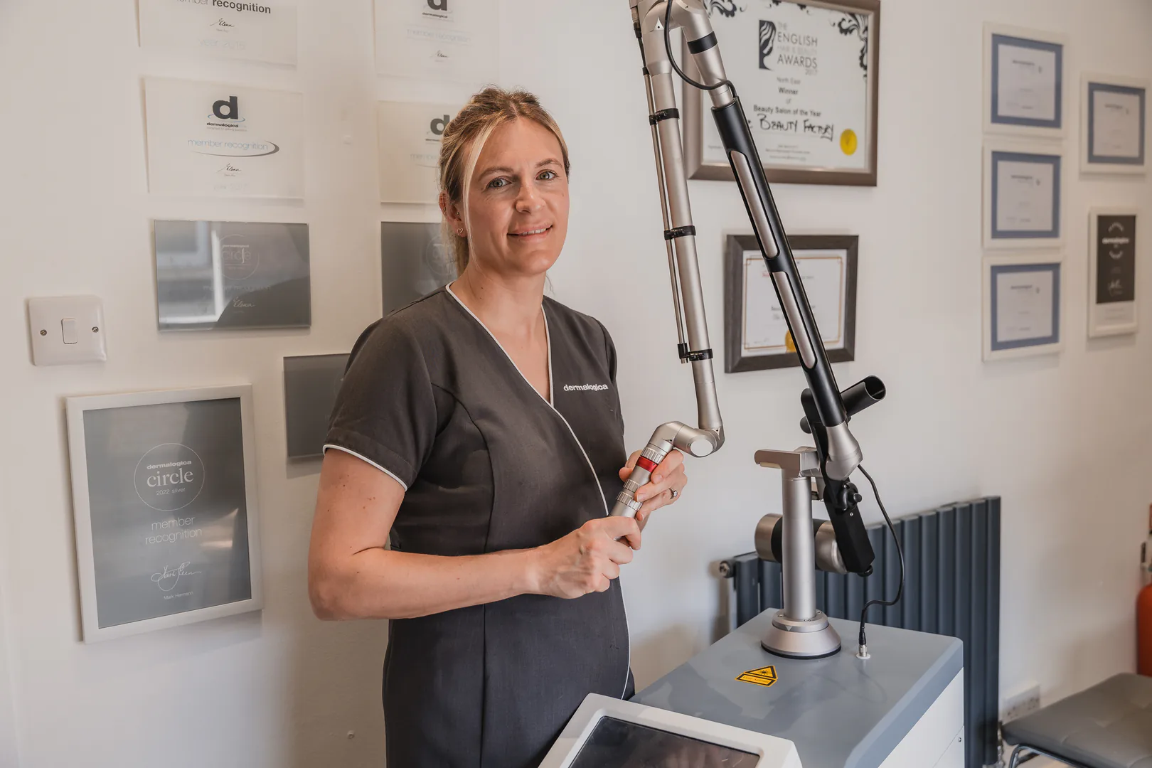Beauty therapist with professional laser equipment at The Beauty Factory in Blyth